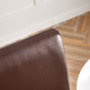 détail matière housse de chaise en simili cuir marron