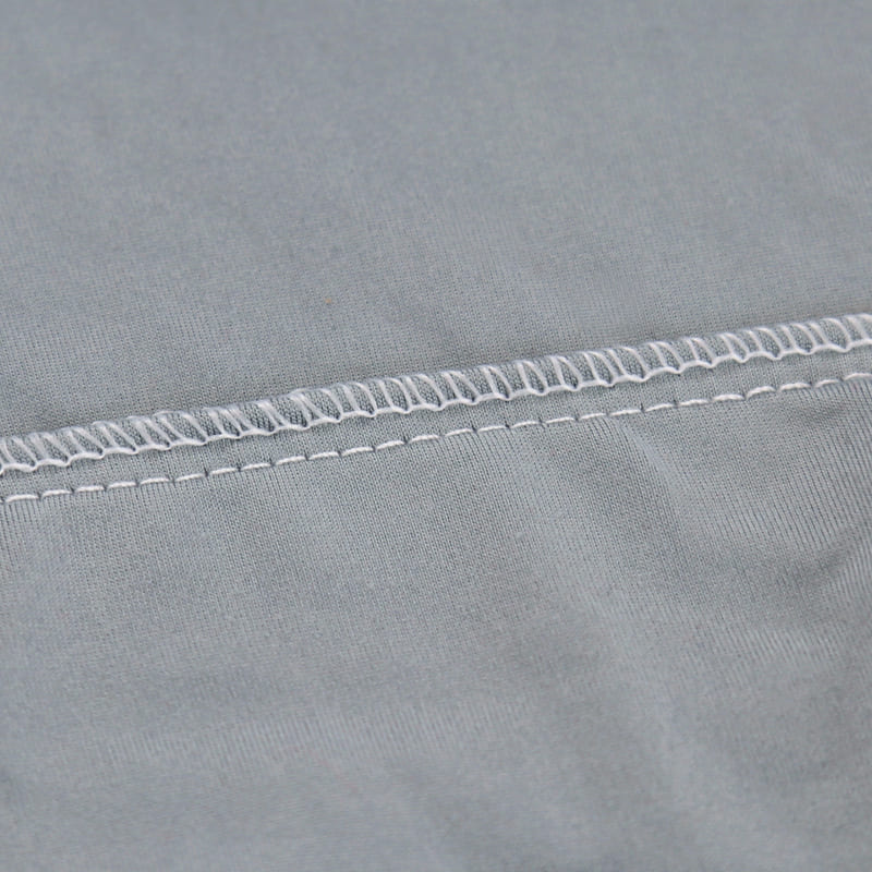 couture housse extensible gris clair pour coussin assise canapé