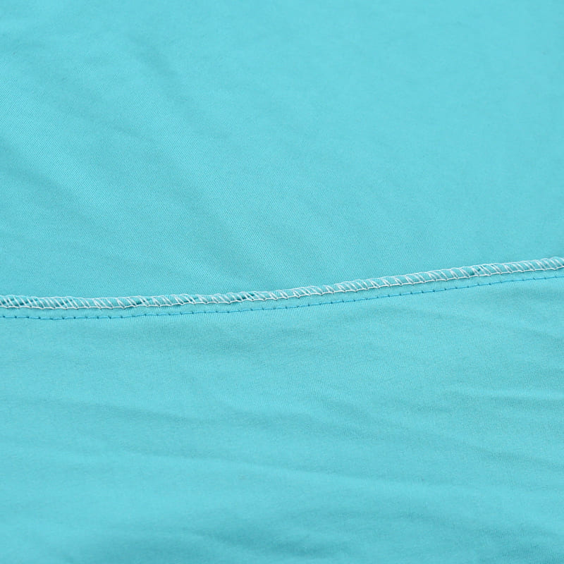 couture housse extensible turquoise pour coussin assise canapé