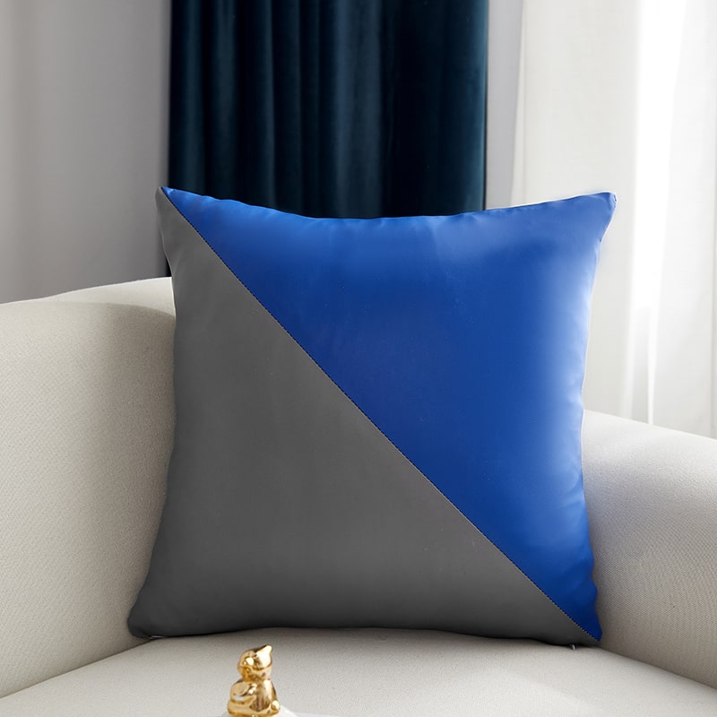 Housse de coussin simili cuir motif triangle bleu et gris