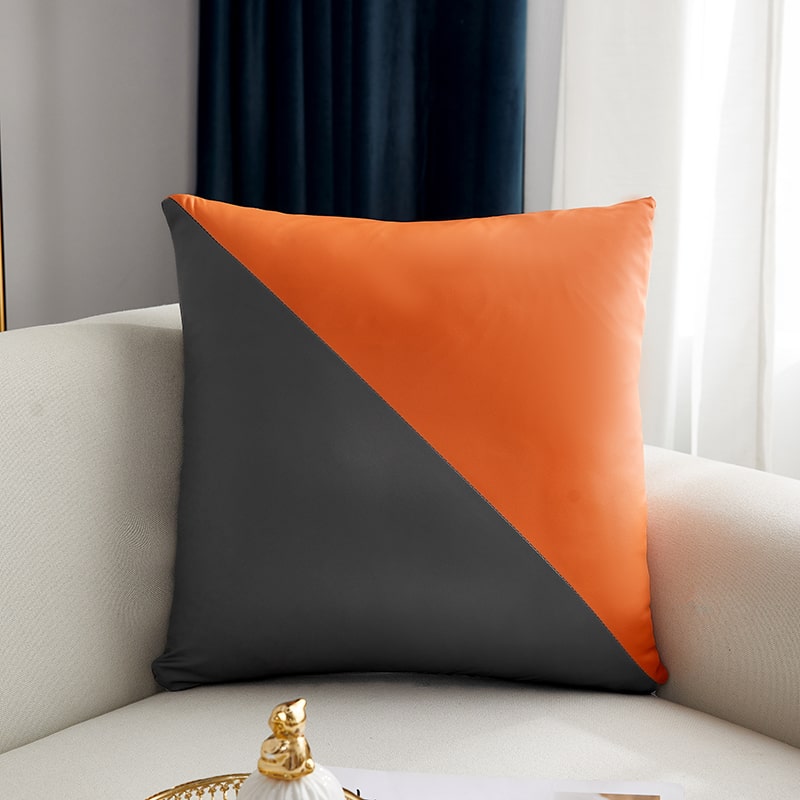 housse de coussin en simili cuir à motif de triangle orange et gris