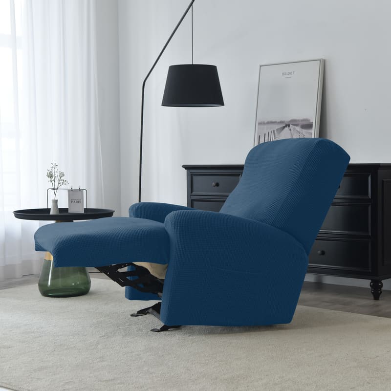 housse jacquard bleu sur un fauteuil relax déplié