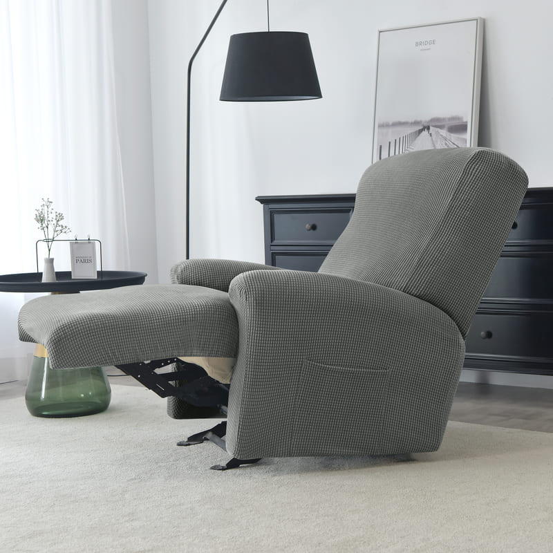 housse jacquard gris sur un fauteuil relax déplié