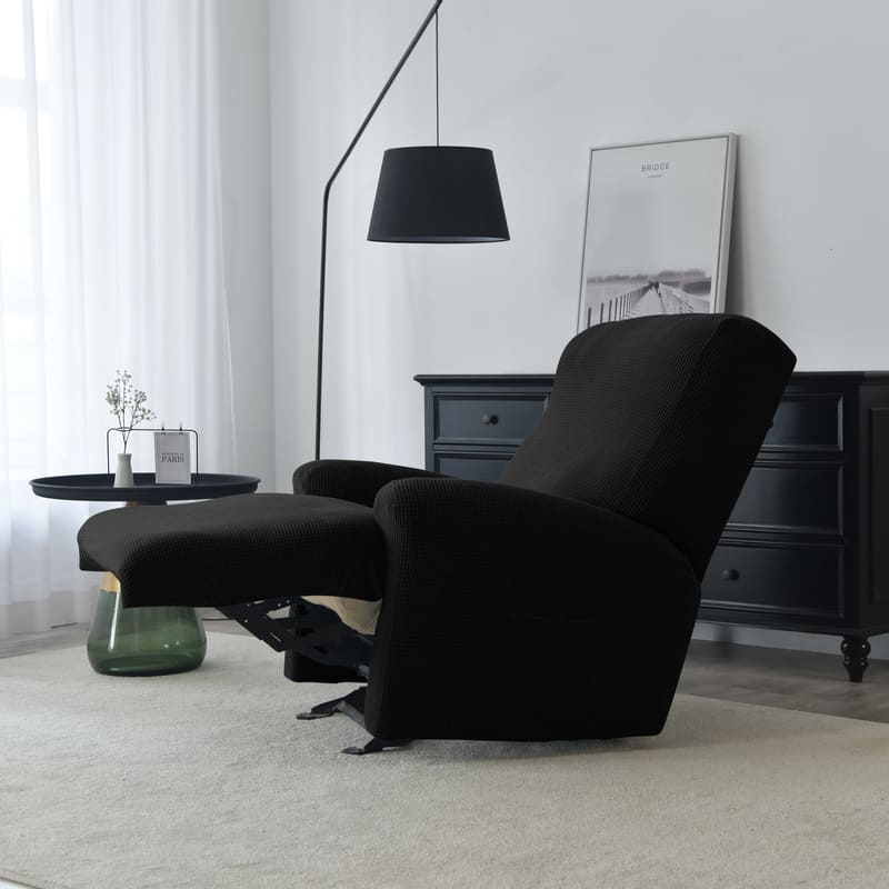 housse jacquard noir sur un fauteuil relax déplié