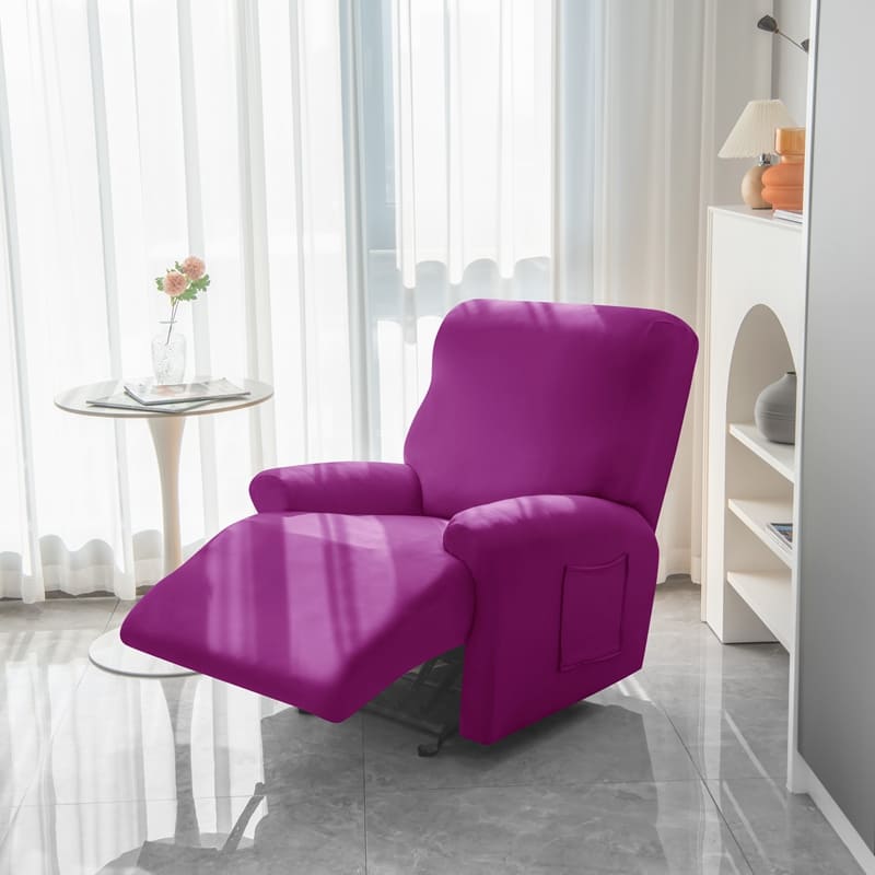 housse magenta sur un fauteuil relax déplié