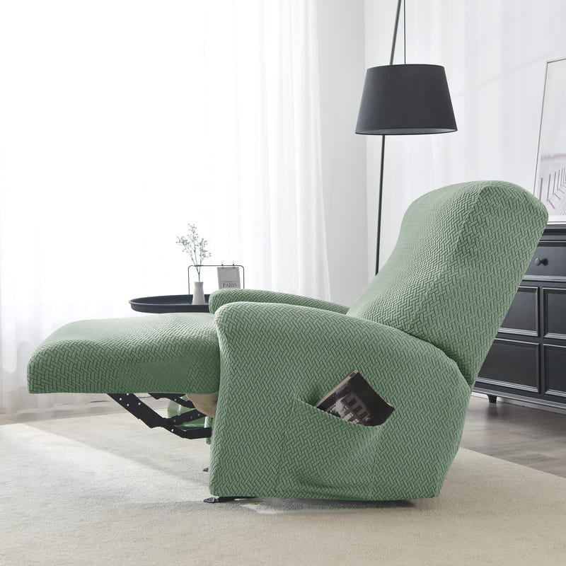 housse microfibre vert clair sur un fauteuil relax déplié