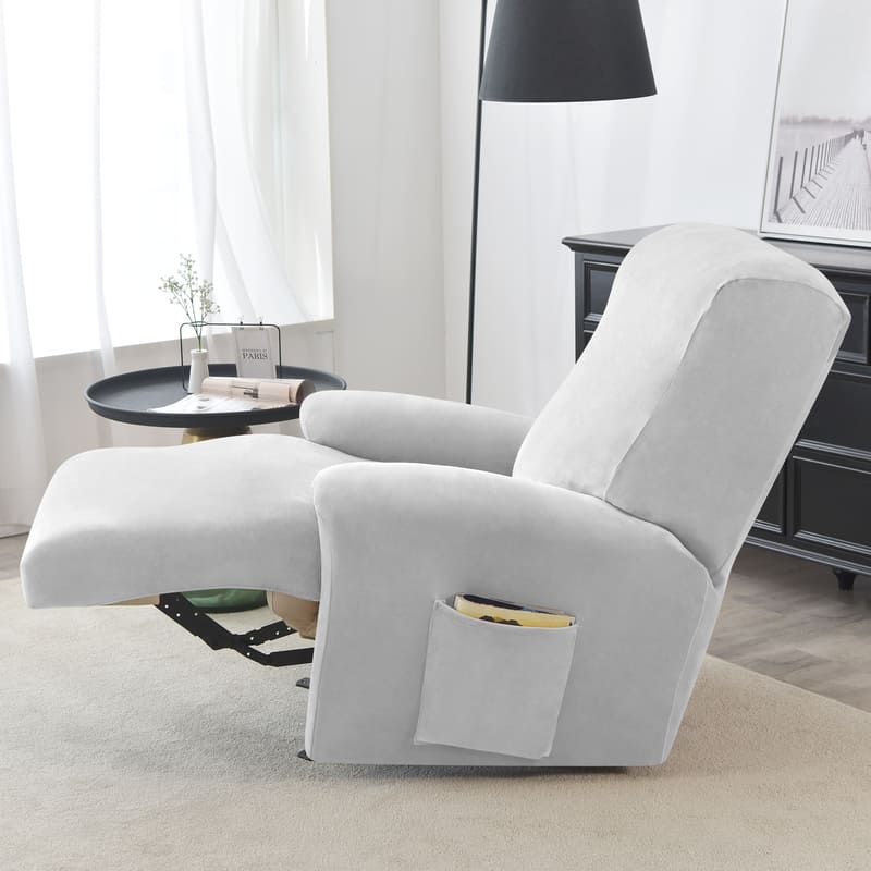 housse velours gris clair sur un fauteuil relax déplié