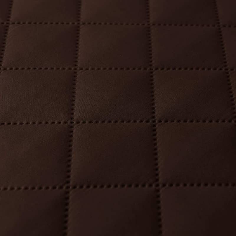 textile protège fauteuil brun