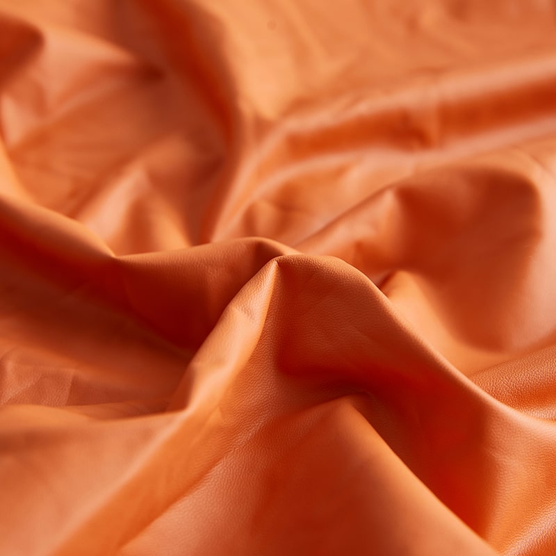 vue rapprochée housse pour coussin d&#39;assise de canapé cuir pu orange