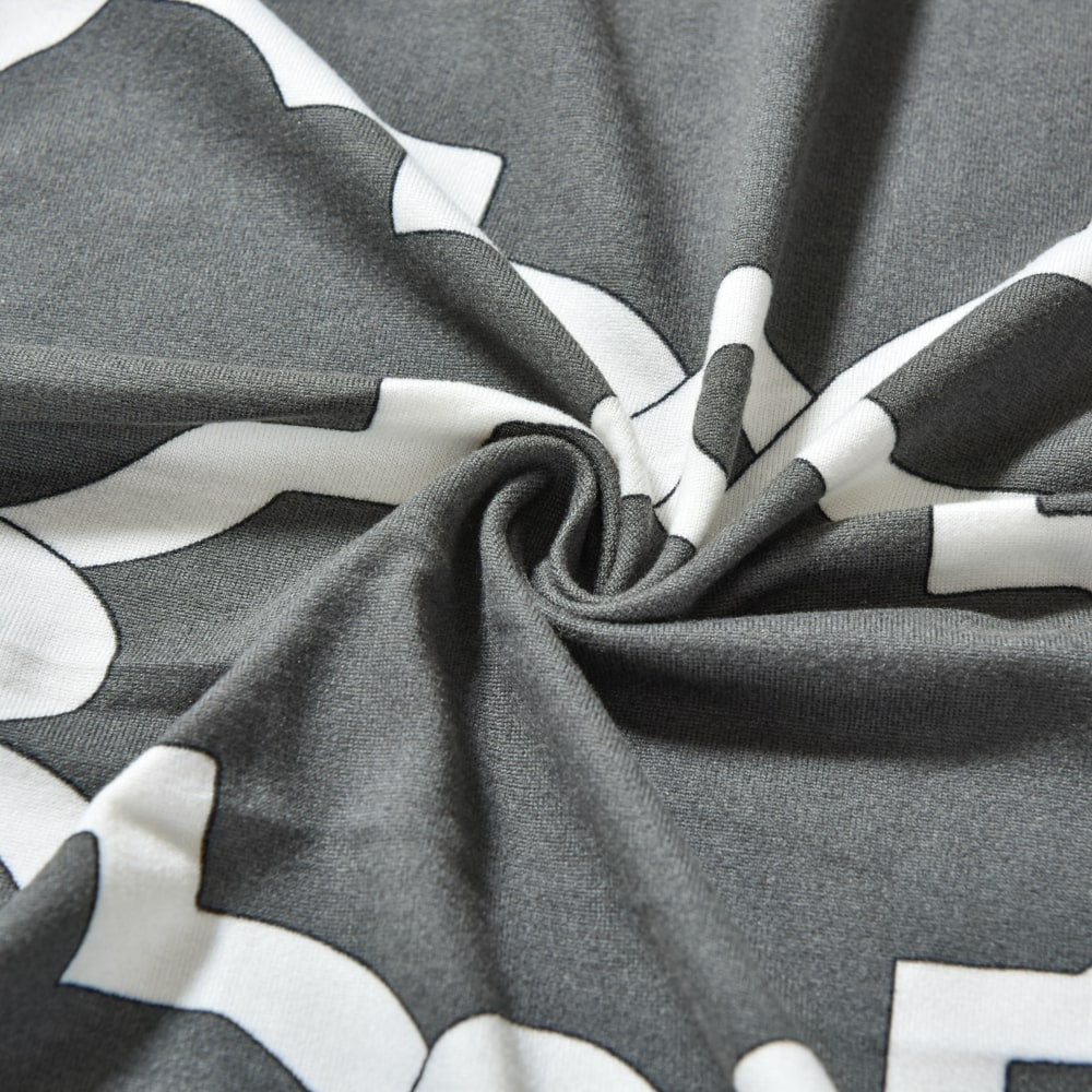 vue rapprochée tissu housse de fauteuil cabriolet extensible grise