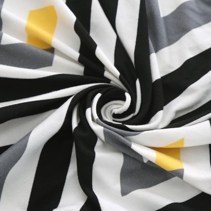 vue rapprochée housse canapé d'angle extensible motif